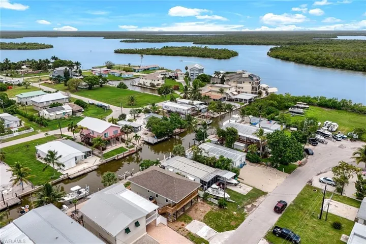 Aerial view of residential area with a nearby body of water