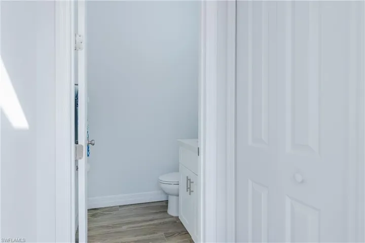 Bathroom featuring vanity and light wood-style flooring