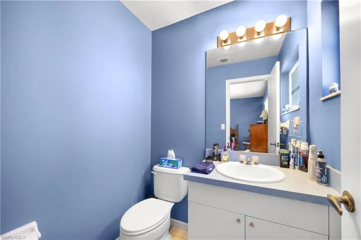 Bathroom featuring toilet and vanity