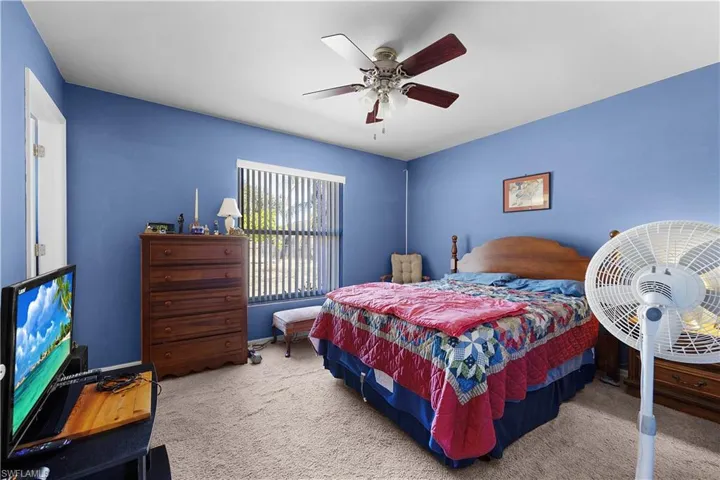 Bedroom with carpet floors and ceiling fan