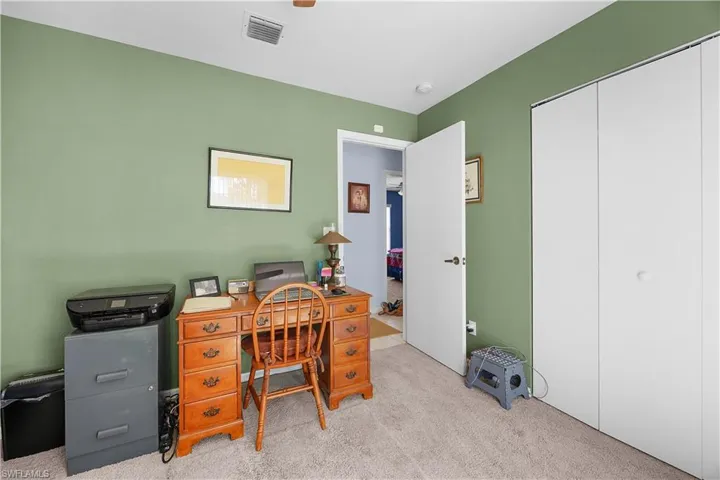 Office area featuring carpet flooring