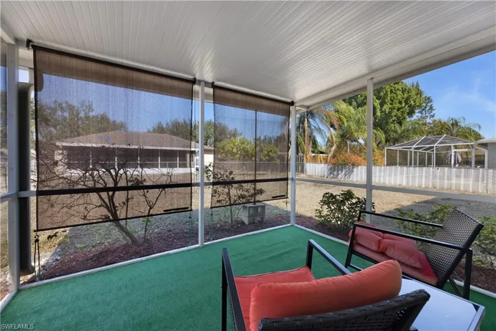 Sunroom / solarium featuring healthy amount of natural light