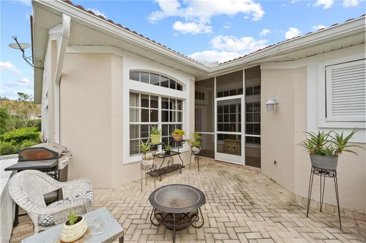 View of patio / terrace featuring an outdoor fire pit and grilling area