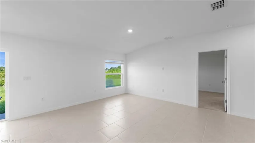 219  Peerless  ST, Lehigh Acres, FL 33974
