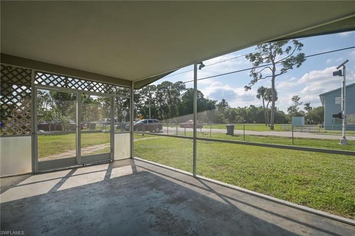 Front screened in patio for outdoor relaxing.