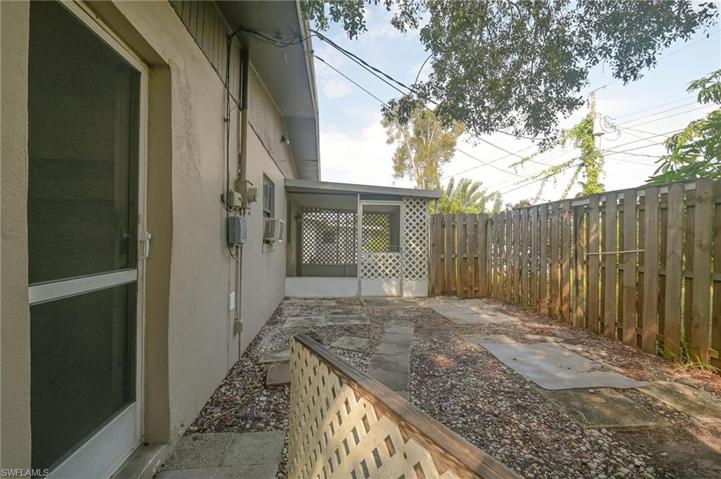 Backyard courtyard with privacy fence.  Also back screened in patio.