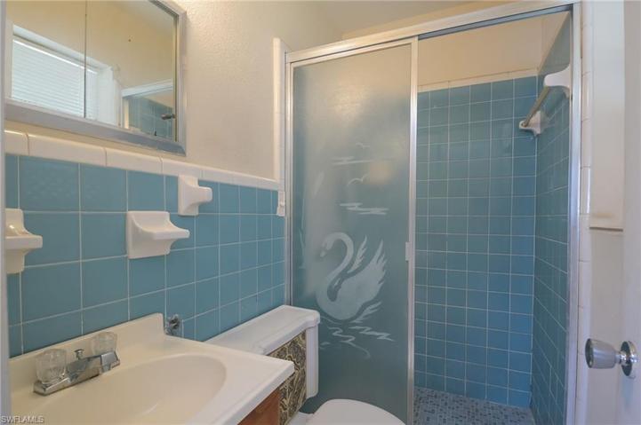 Master bath with shower, sink, and medicine cabinet