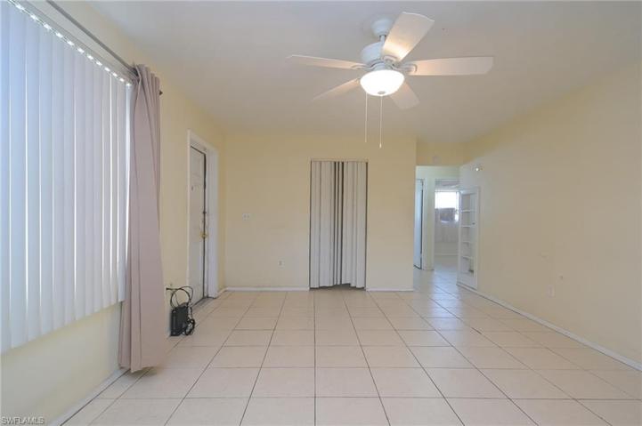 View of living area facing hallway to 3 bedrooms.
