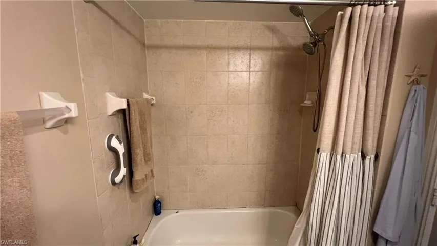 Bathroom featuring shower / tub combo