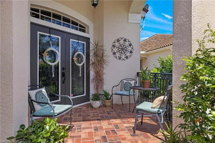 Doorway to property featuring french doors
