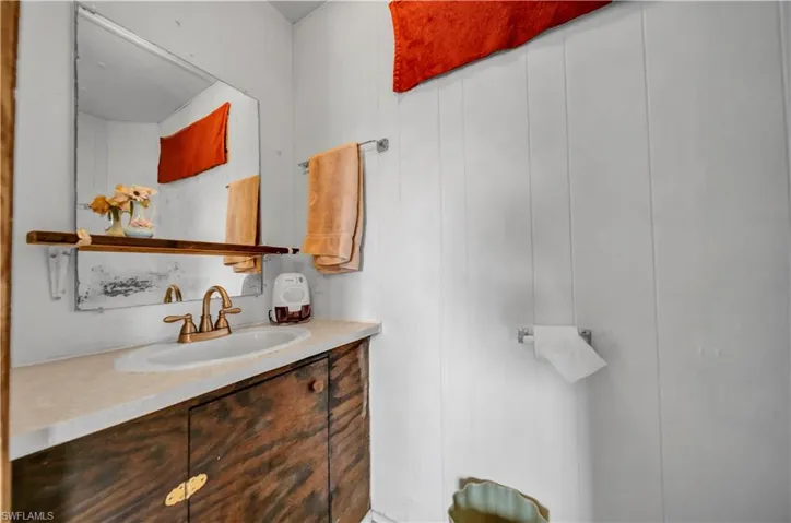 1/2 Bathroom featuring vanity