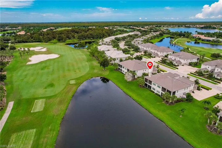 Aerial View-Building with Lake and Golf Course