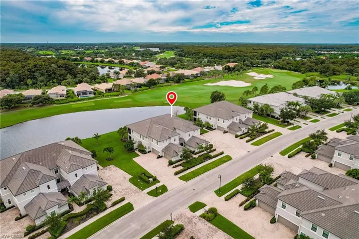 Aerial View-Building with Golf Course and Lake