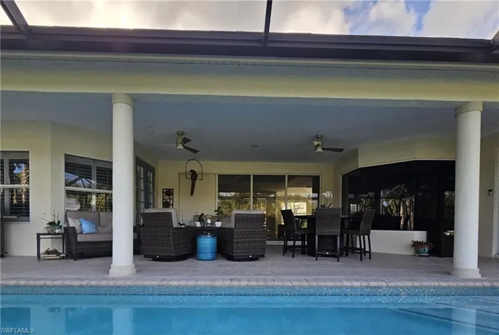 Outdoor pool with an outdoor hangout area, a patio area, and outdoor dining area