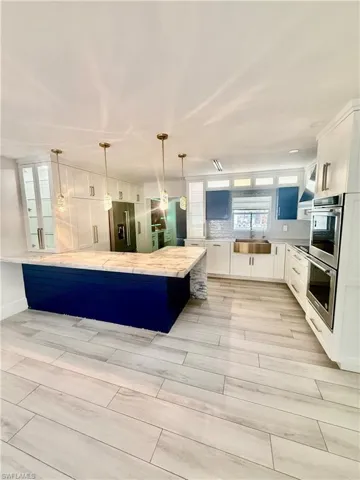 733  Pine Cone  LN, Naples, FL 34104