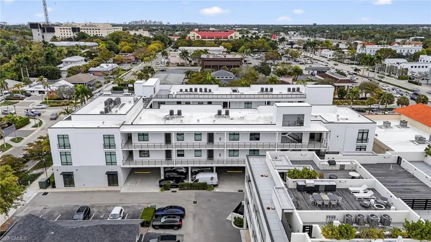 Drone / aerial view of apartment complex / building