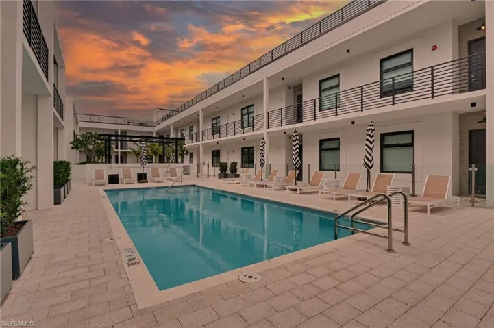 Community pool featuring a patio area