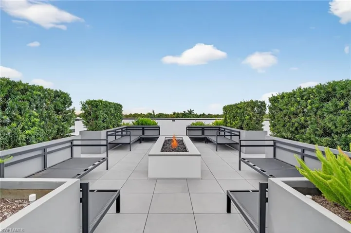View of patio / terrace with an outdoor living space with a fire pit