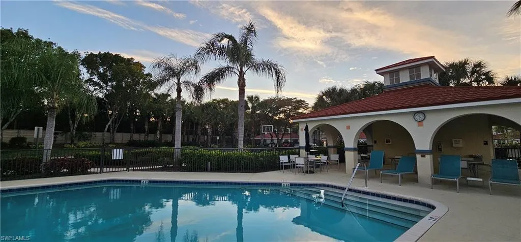 another Pool with a patio area , bathrooms, pier