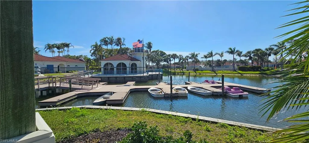 View of boat docks with a water view