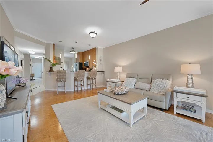 Living Area featuring Crown Molding
