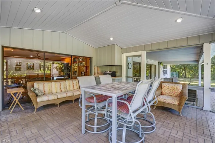 View of patio / terrace featuring outdoor dining space and grilling area