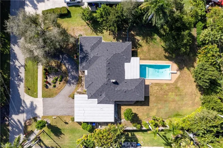 View from above of property featuring a pool