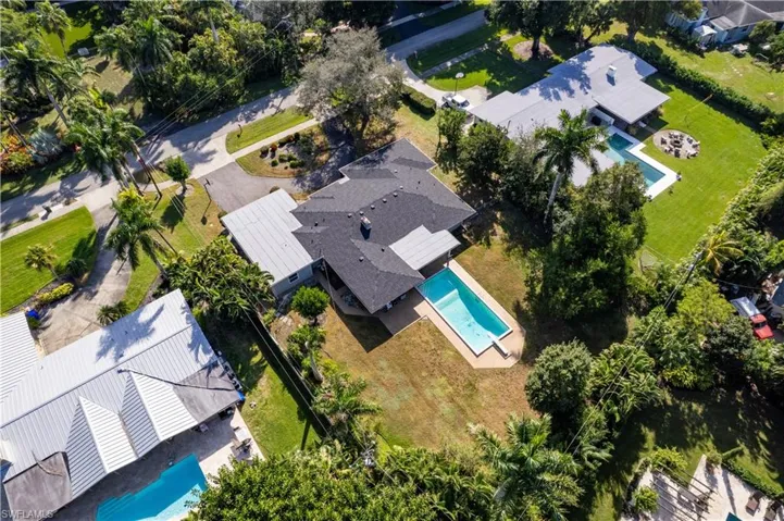 Aerial view of residential area with a pool area