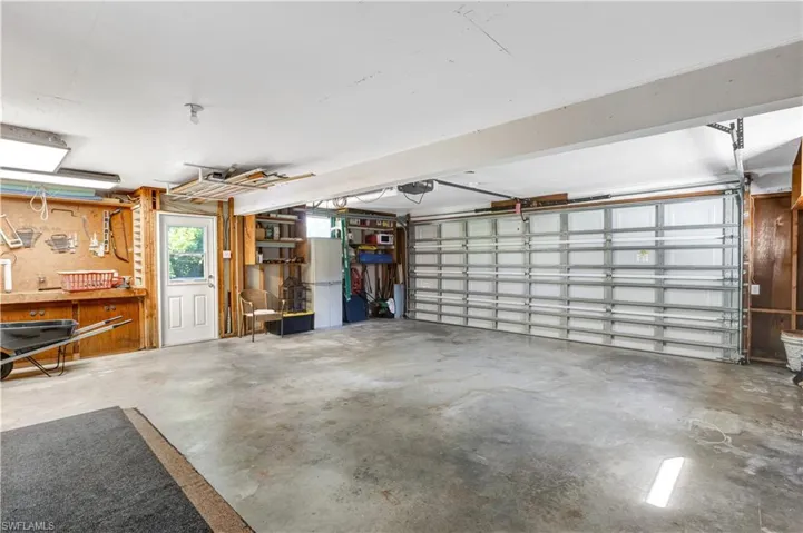 Garage featuring a workshop area