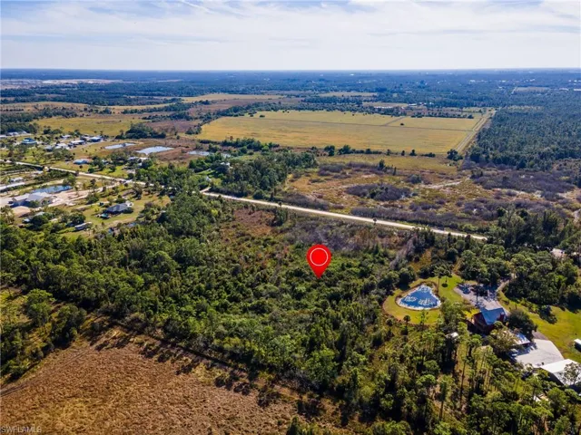 Aerial view of property's location with rural landscape