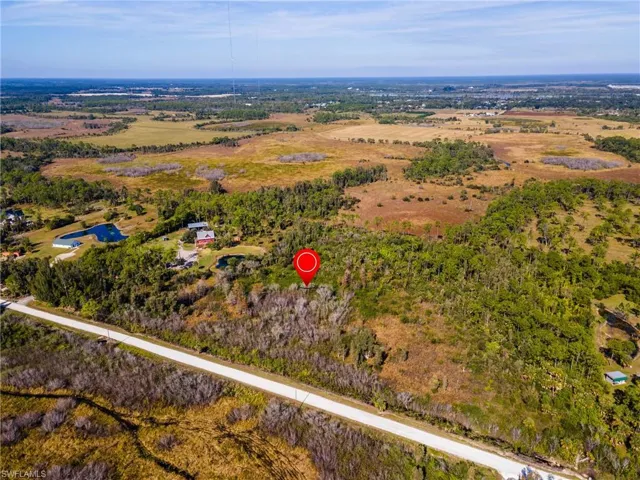 Aerial view of property's location with rural landscape