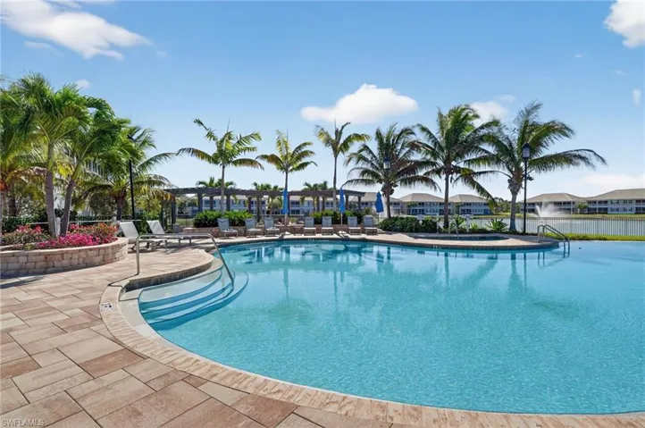 Community pool featuring a patio area