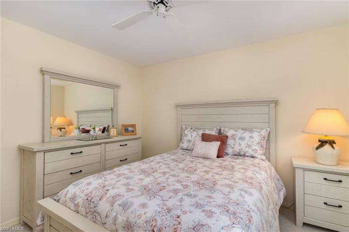 Guest bedroom with entrance to guest bath