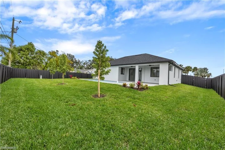 View of yard featuring a patio area and a fenced backyard