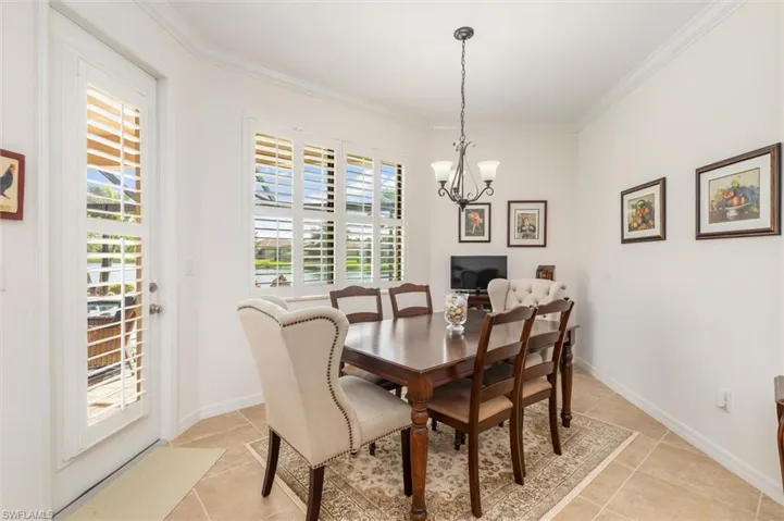 Spacious dinette with door to pool area