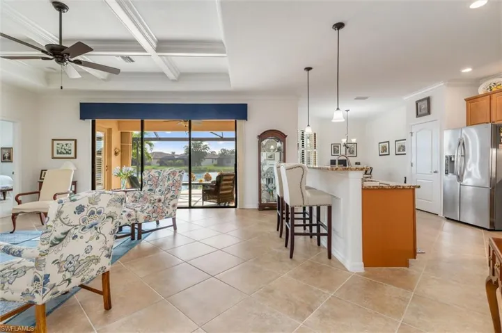 Sliders to pool from family room and kitchen
