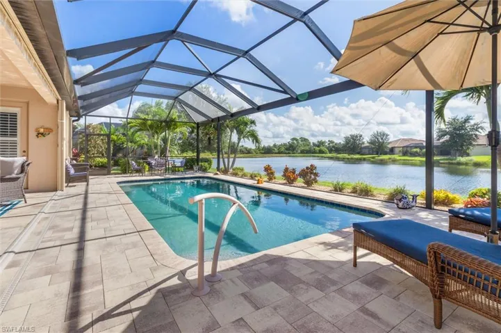 Screened custom pool with water views