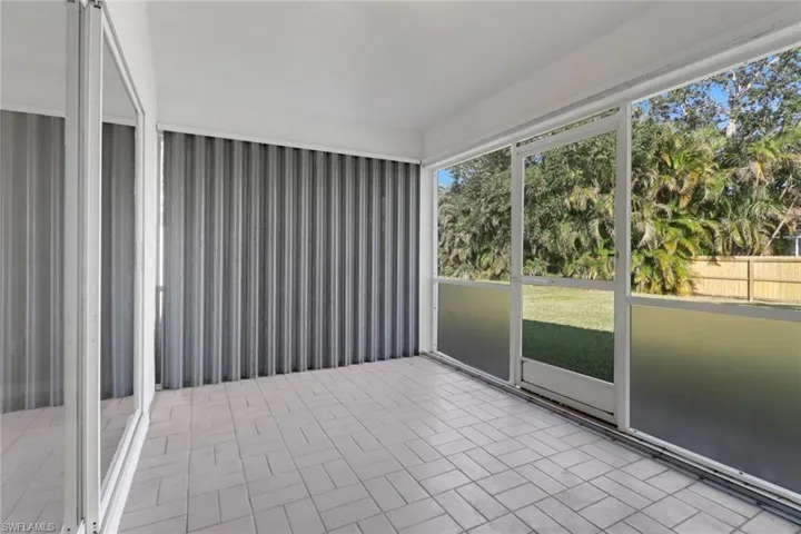 screened lanai with hurricane shutters which are removable