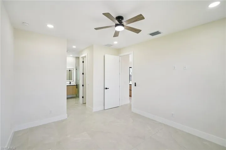 Unfurnished room with recessed lighting and ceiling fan