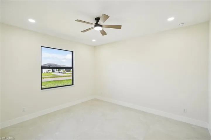 Spare room with recessed lighting and ceiling fan