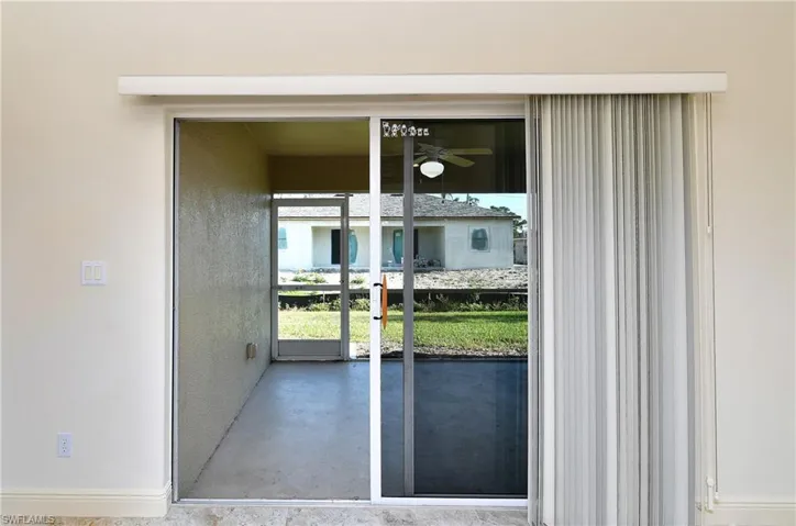 Detailed view of concrete flooring and ceiling fan