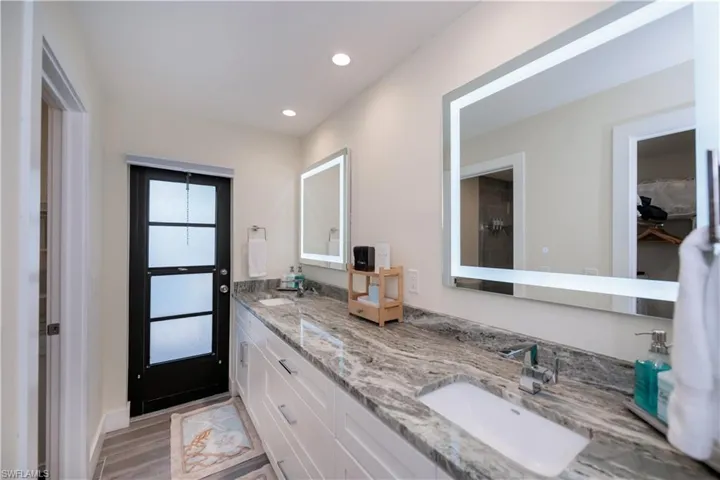 Master bath has access to pool area