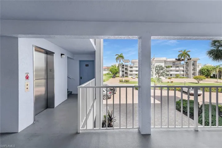 Balcony featuring elevator