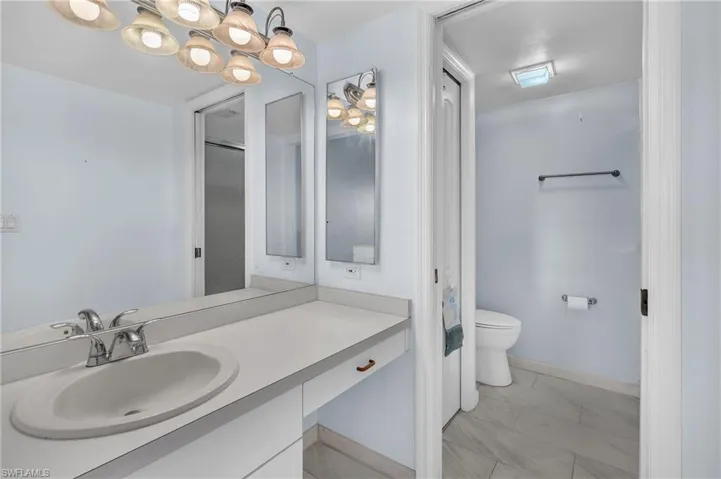 Bathroom featuring toilet and vanity