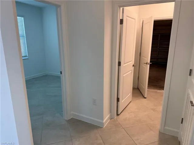 Hallway connecting bedroom 1 and the laundry room/exit to grage