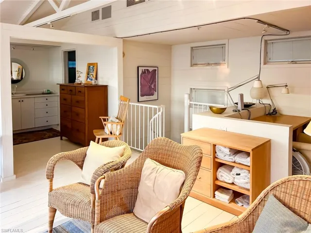 Sitting room featuring light hardwood / wood-style floors