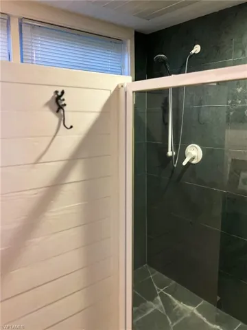Bathroom with an enclosed shower