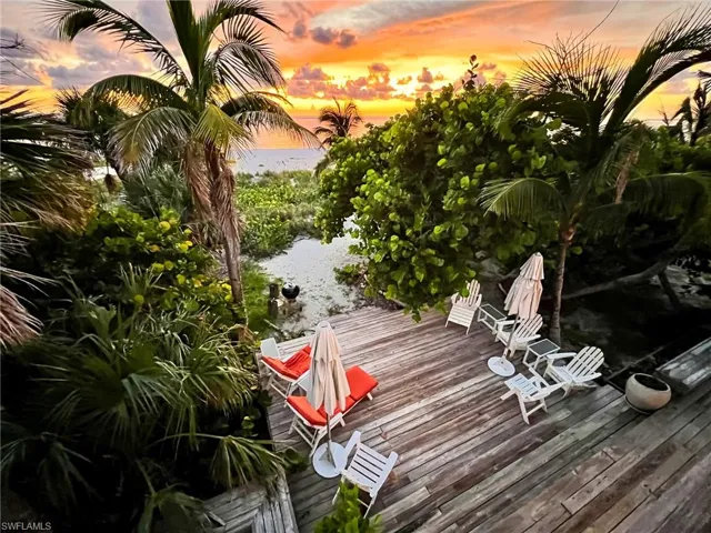Deck at dusk with a water view