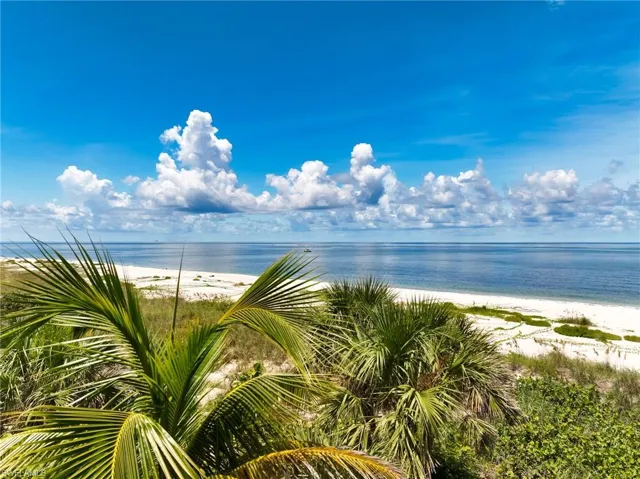 View of water feature featuring a beach view