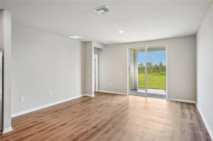 Spare room featuring light hardwood / wood-style floors